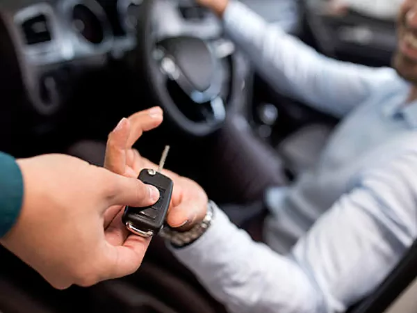 Hand Overing Key for Long Term Car Rental.